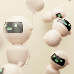 Small white robots with a green happy face floating